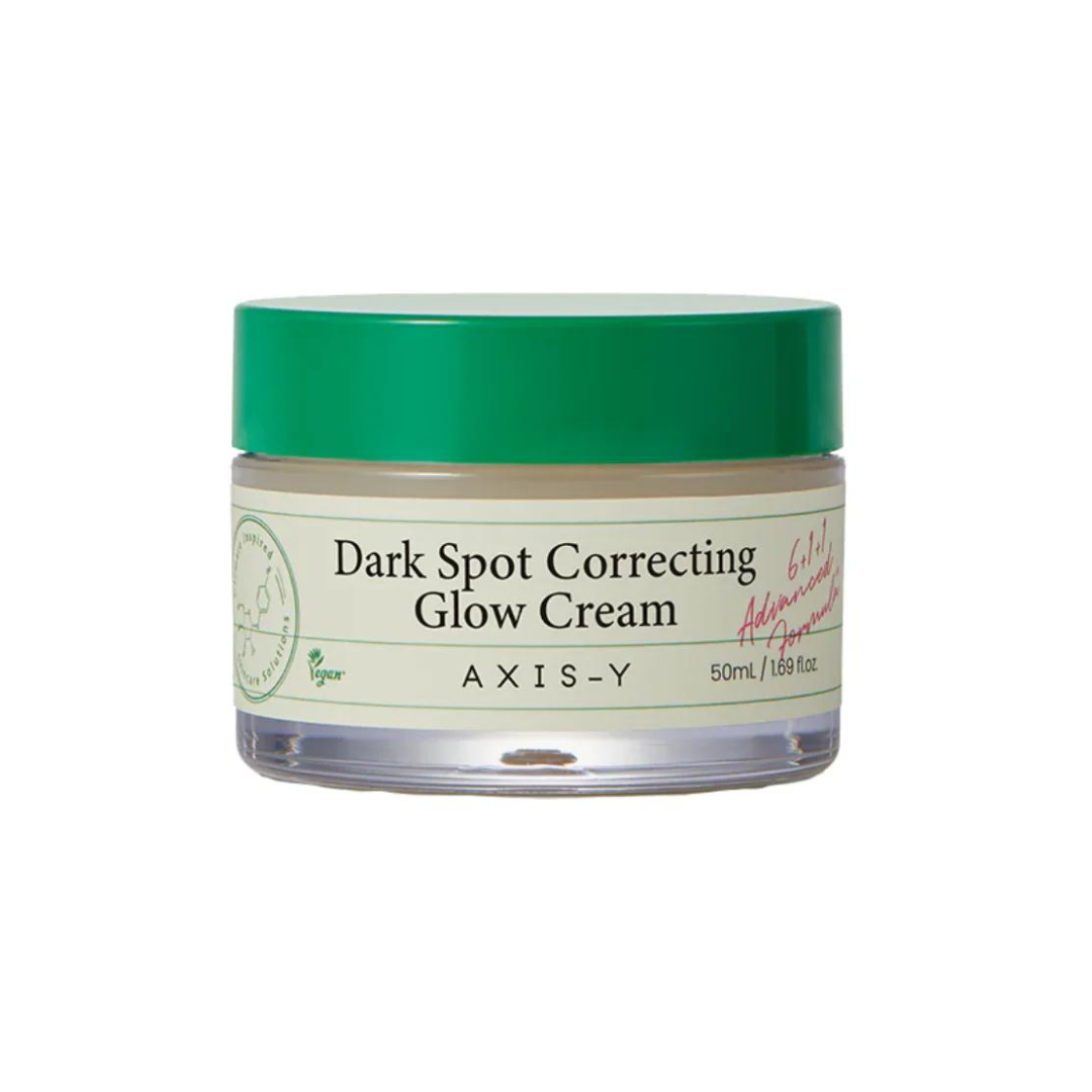 Jar of Axis-Y Dark Spot Correcting Glow Cream with green lid on a white background