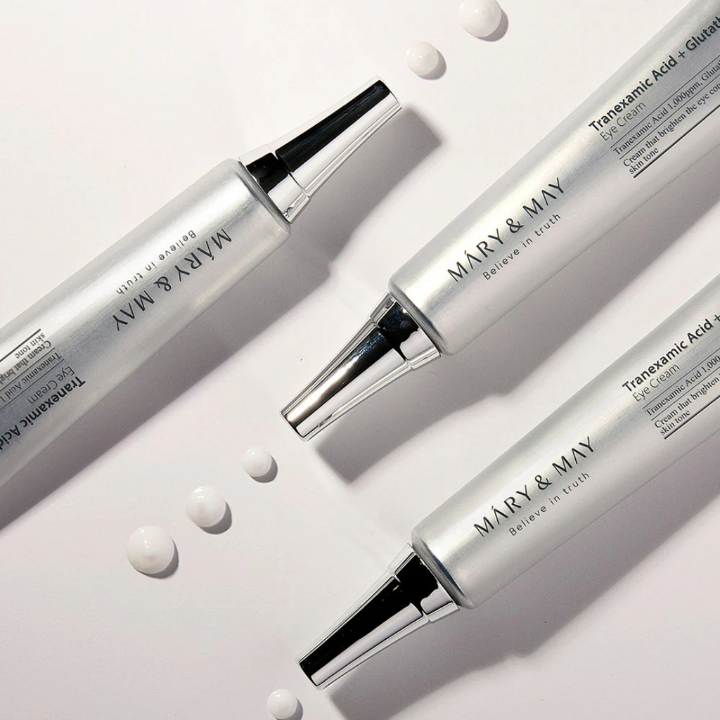 Three 'Mary & May' skincare products on a light background