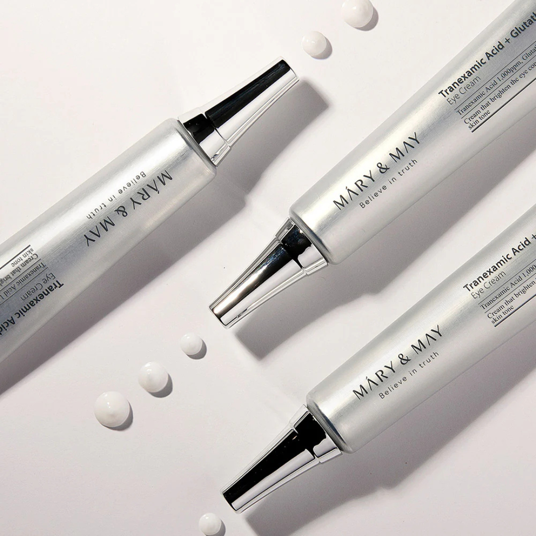 Three 'Mary & May' skincare products on a light background