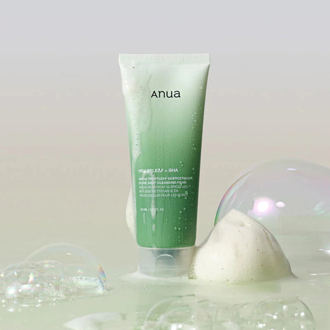 Green skincare product with 'anua' branding on a light background