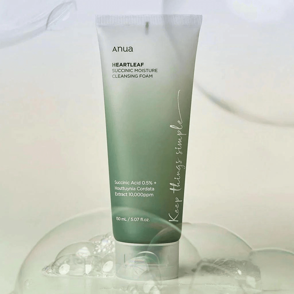 Tube of Anua Heartleaf Suconic Moisture Cleansing Foam with bubbles on a light background