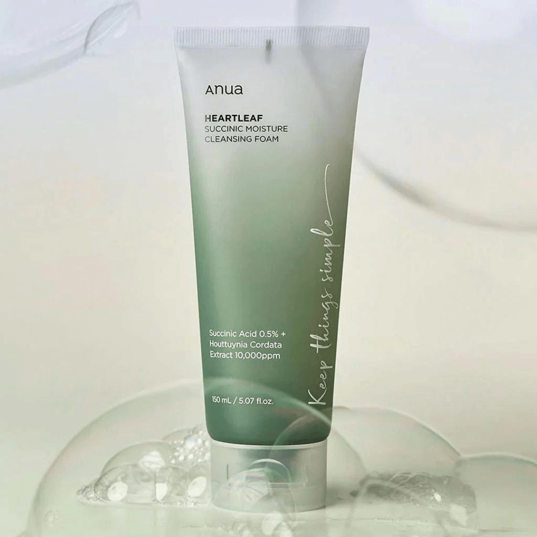 Tube of Anua Heartleaf Suconic Moisture Cleansing Foam with bubbles on a light background