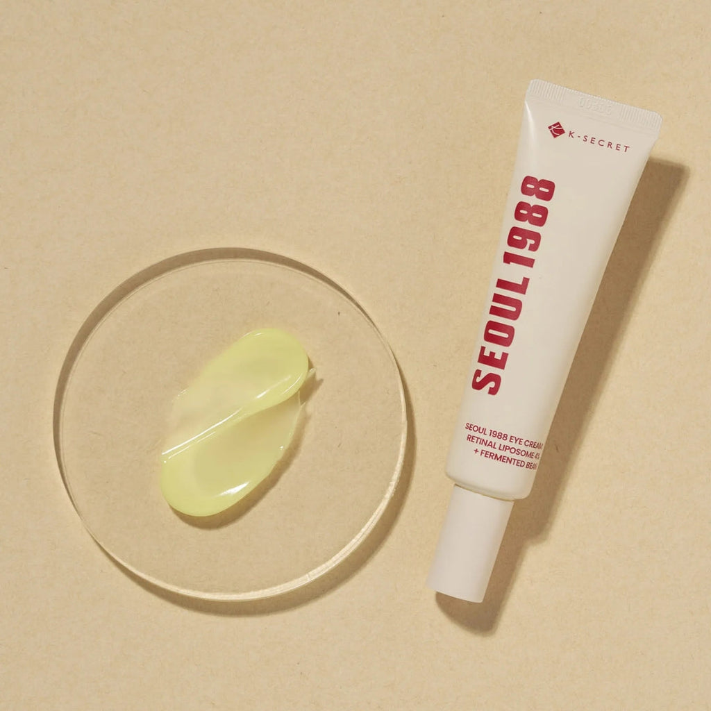 Skincare tube labeled 'Seoul 1988' with a sample on a clear dish against a beige background